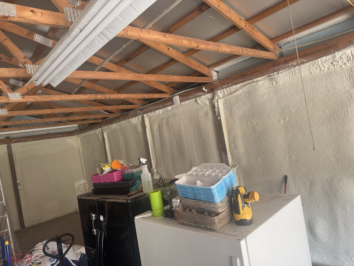 The length of the barn with the roof foamed.
