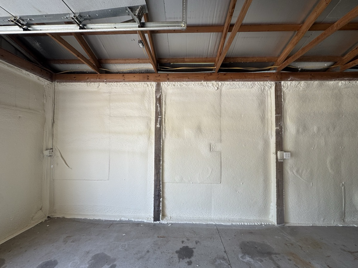 The block wall and roof line where they meet.