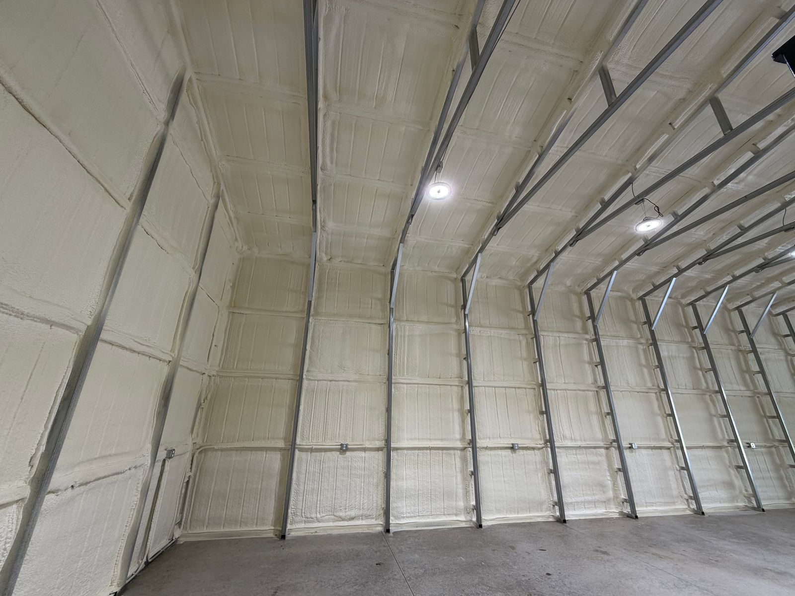 Foamed walls and roof along one side of the building.